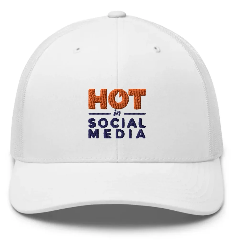 A white baseball hat with the Hot in Social Media logo embroidered on it